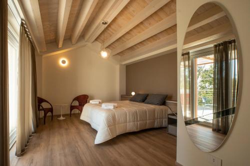 Una cama o camas en una habitación de Hotel Belvedere Resort
