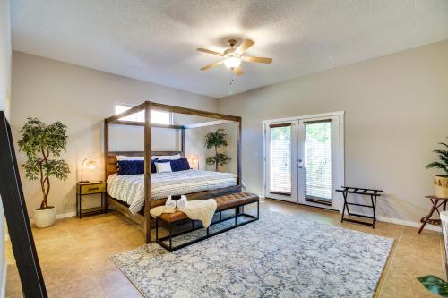 a bedroom with a bed and a ceiling fan at Pet-Friendly Albuquerque Vacation Escape! in Albuquerque