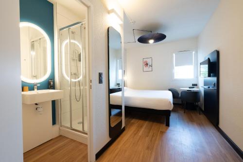 ibis Perpignan Sud Saint Charlesにあるベッド