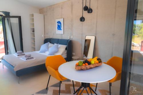 Ένα ή περισσότερα κρεβάτια σε δωμάτιο στο Apartman Marisari