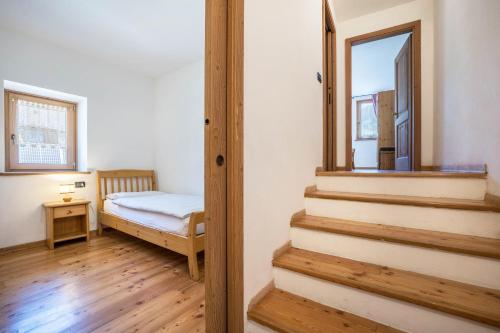 Postel nebo postele na pokoji v ubytování Agritur piazera con terrazzo