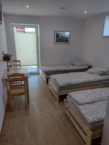 Ένα ή περισσότερα κρεβάτια σε δωμάτιο στο Villa na Chabrowej
