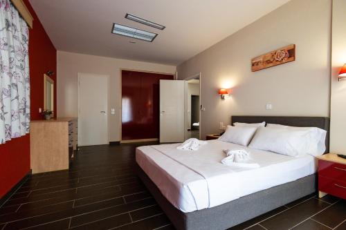 Ένα ή περισσότερα κρεβάτια σε δωμάτιο στο Panorama Resort