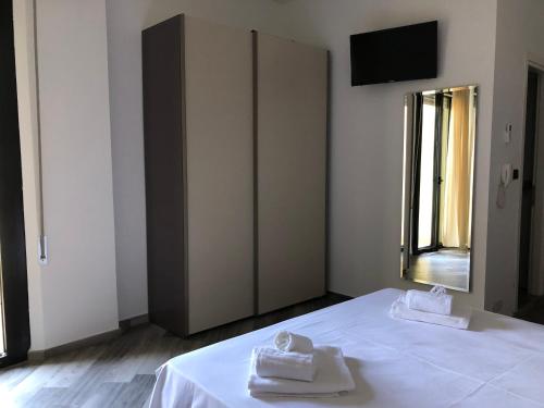 Postel nebo postele na pokoji v ubytování Vinsea Hotel