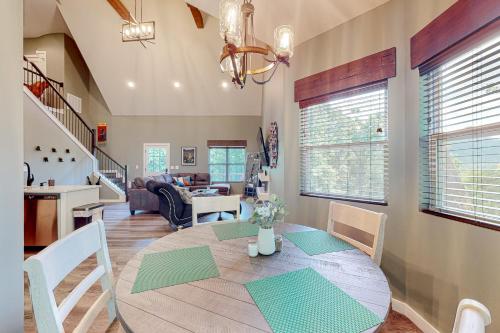 a dining room and living room with a dining table at Blue Ridge Delight in Clayton