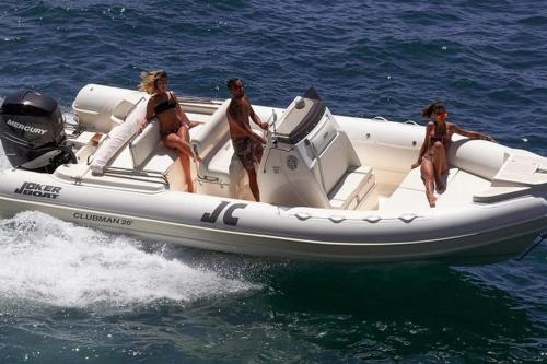 a group of people on a boat in the water at Appartamenti DueC in Trapani