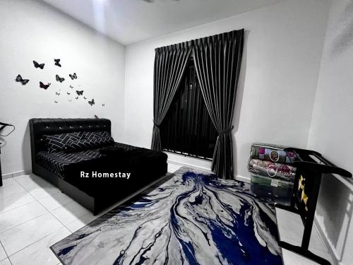 a bedroom with a bed and a window with bats on the wall at Rz Homestay in Malacca
