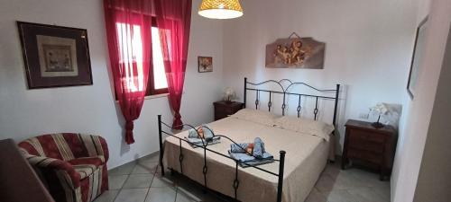 Basilicata Host to Host - BORGO SAN BASILIOにあるベッド