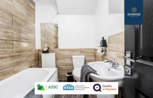 A bathroom at 2 BED LAW - 2 rooms, 4 Double Beds, Fully Equipped, Free Parking, WiFi, 3xSmart TVs, Groups, Families, Food, Shops, Bars, Short - Long Stays, Weekly or Monthly Rates Available by SUNRISE SHORT LETS