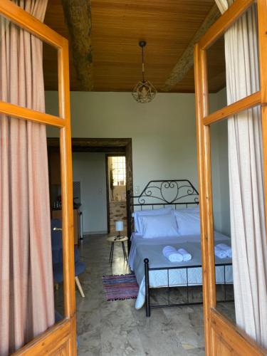 a bedroom with a bed in a room at 1924 Studios 2 in Áyios Pétros