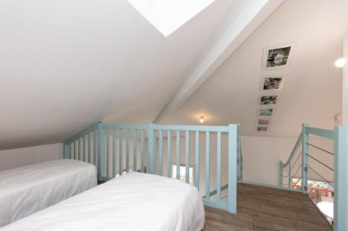 Postel nebo postele na pokoji v ubytování Écrin de Sable