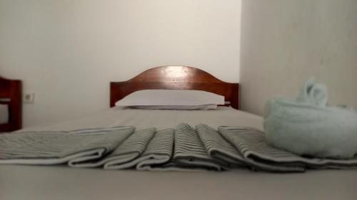 Ένα ή περισσότερα κρεβάτια σε δωμάτιο στο Bajo Hotel