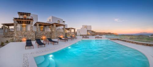 a view of a pool at a villa at Legendary Suites in Mýkonos City