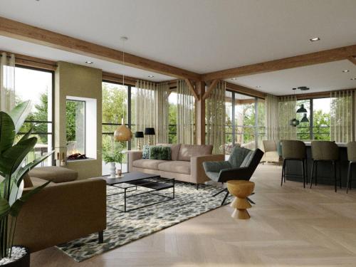 un salon avec un canapé et une table dans l'établissement Luxurious Villa in Texel, à De Cocksdorp
