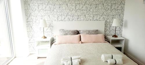 Ένα ή περισσότερα κρεβάτια σε δωμάτιο στο Fortress Stay