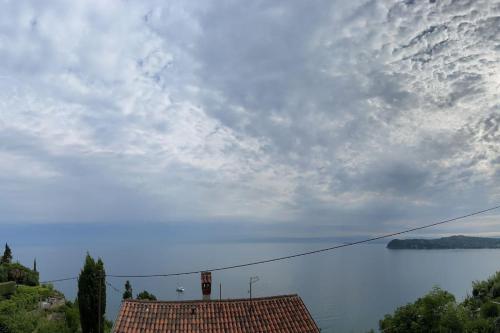 a view of the water and a sky at Sunrise SeaView Apartment Fiesa in Piran