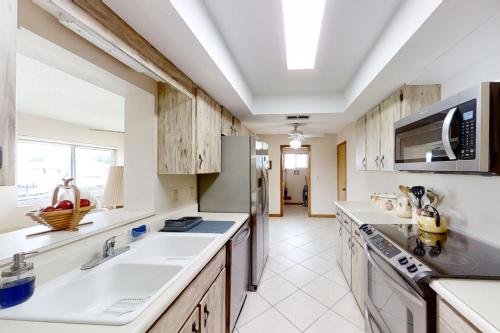 Køkken eller tekøkken på Citrus Cottage