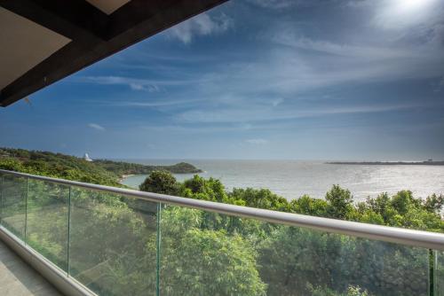 a view of the ocean from the balcony of a house at Agnus Unawatuna in Unawatuna