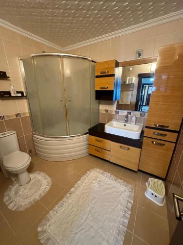 Koupelna v ubytování Boztepe Deniz Manzaralı 3+1 Daire