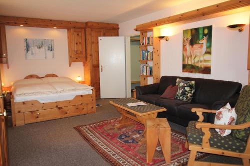 Postel nebo postele na pokoji v ubytování Residenza Lagrev 2 Zimmerwohnung Nr 027 - Typ 20A - Hochparterre - Süd