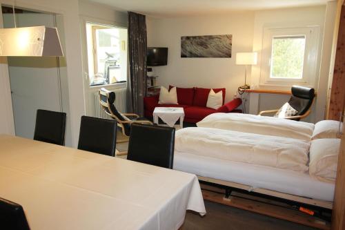 Voodi või voodid majutusasutuse Residenza Lagrev 2 Zimmerwohnung Nr 102 - Typ 21A - 1 Etage - Süd toas