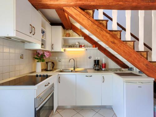 Kuchyň nebo kuchyňský kout v ubytování Holiday Home Pinia II by Interhome