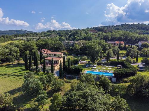 an aerial view of a resort with a pool and trees at Holiday Home Lavanda by Interhome in Badia Agnano