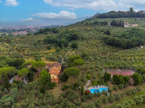 an aerial view of a house with a swimming pool at Holiday Home Tenuta San Lazzaro by Interhome in Montevettolini