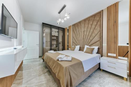 Ένα ή περισσότερα κρεβάτια σε δωμάτιο στο Villa AS