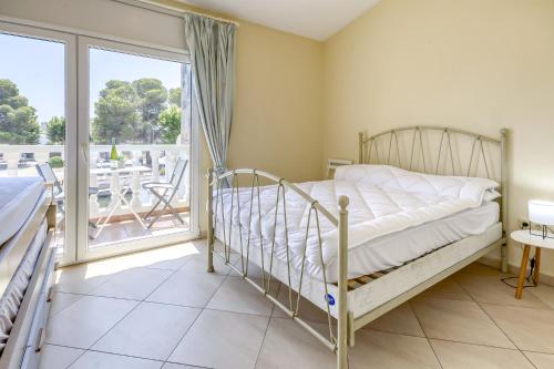 Postel nebo postele na pokoji v ubytování Port Petit 10 Empuriabrava Amarre 3x8 -Immo Barneda