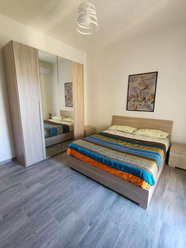 Säng eller sängar i ett rum på Appartamento zona Novoli