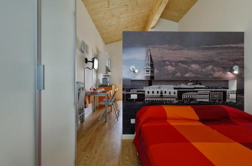 Eco Venice tesisinde bir odada yatak veya yataklar