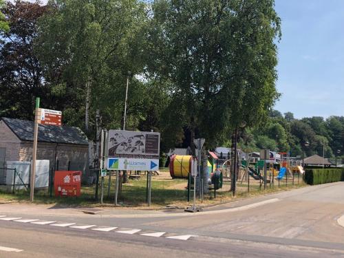 a playground on the side of a road at « En toute simplicité chez Fabienne et Bruno » in Waimes