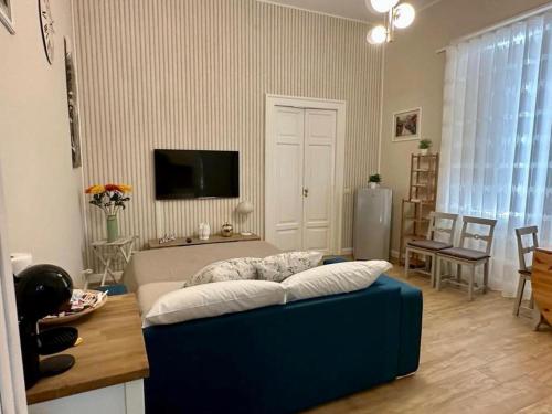 TV a/nebo společenská místnost v ubytování Home Pompei Olympus