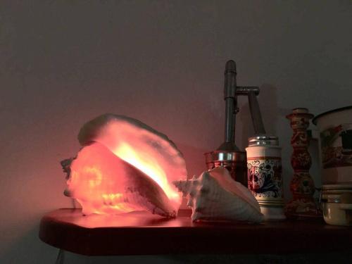 a table with a light up object on it at Casita Sac-Nicté in Mahahual