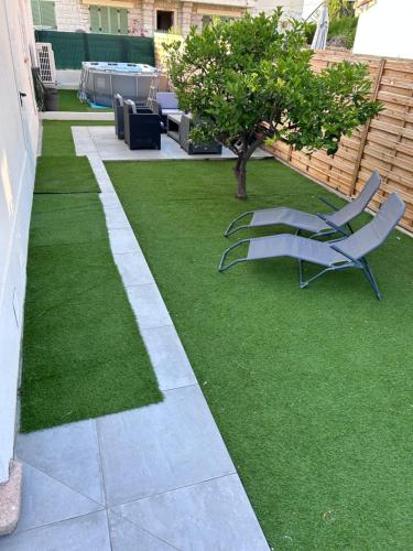 Zahrada ubytování Superbe appartement dans villa