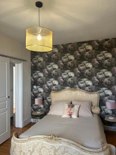 Posteľ alebo postele v izbe v ubytovaní Gîte de la comtesse château de la Bouchatte