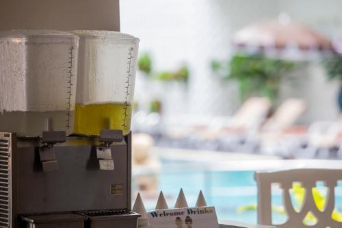 a glass of beer sitting on top of a machine at Sabai Sabana in Pattaya Central