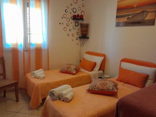 Posteľ alebo postele v izbe v ubytovaní CupidoHouse a Mondello