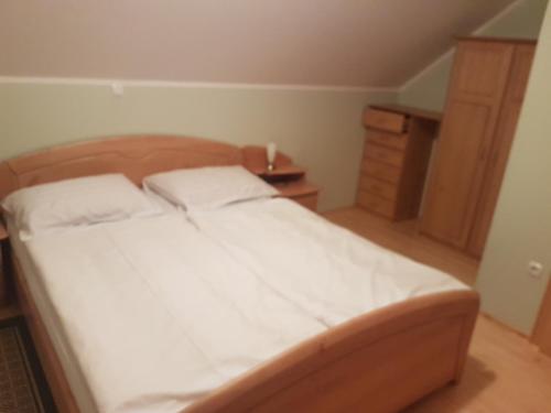 Postel nebo postele na pokoji v ubytování Apartment Ski slope