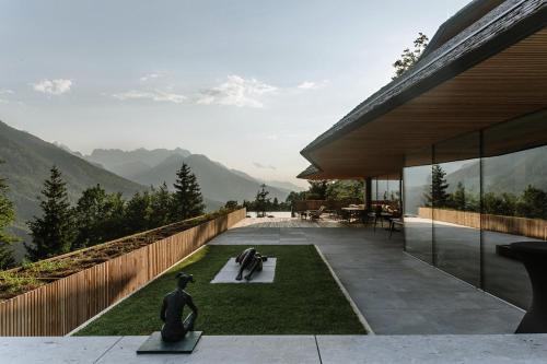 a house with a view of the mountains at Chalet Sofija in Gozd Martuljek
