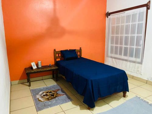 En eller flere senge i et værelse på Casa equipada en puerto escondido
