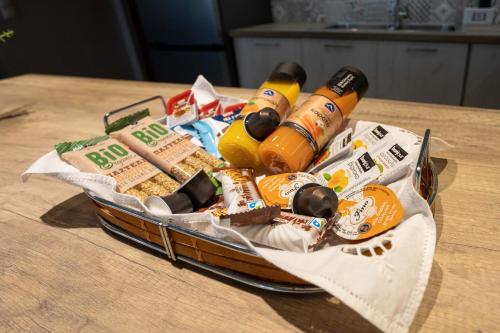 a basket filled with food on top of a table at Luxury & Cozy apartment in Messini