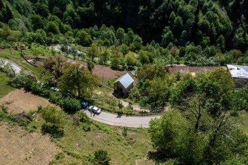 an aerial view of a house in a forest at Hotel Voisa/სასტუმრო ვოისა in Batumi