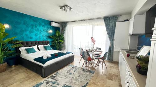 Ένα ή περισσότερα κρεβάτια σε δωμάτιο στο Bellemonde - Studio pe plaja cu vedere la mare