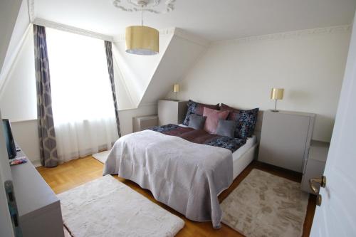 Posteľ alebo postele v izbe v ubytovaní Aranyhaj Apartman