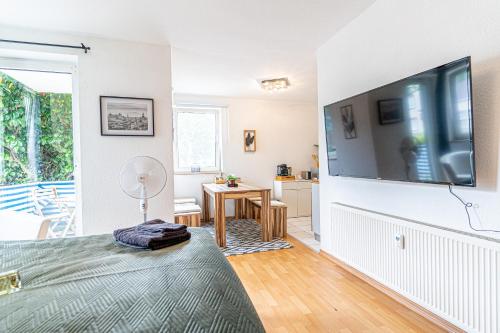 TV a/nebo společenská místnost v ubytování Apartment Wesseling