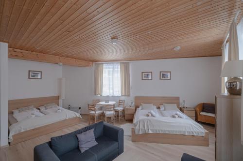 Postel nebo postele na pokoji v ubytování Alpenpension Haslinger