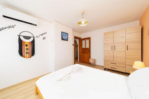 Postel nebo postele na pokoji v ubytování Central Flat with Balcony and Terrace in Muratpasa