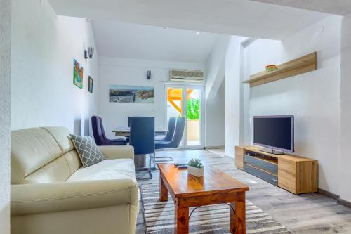 Μια τηλεόραση ή/και κέντρο ψυχαγωγίας στο Apartmani Rialto